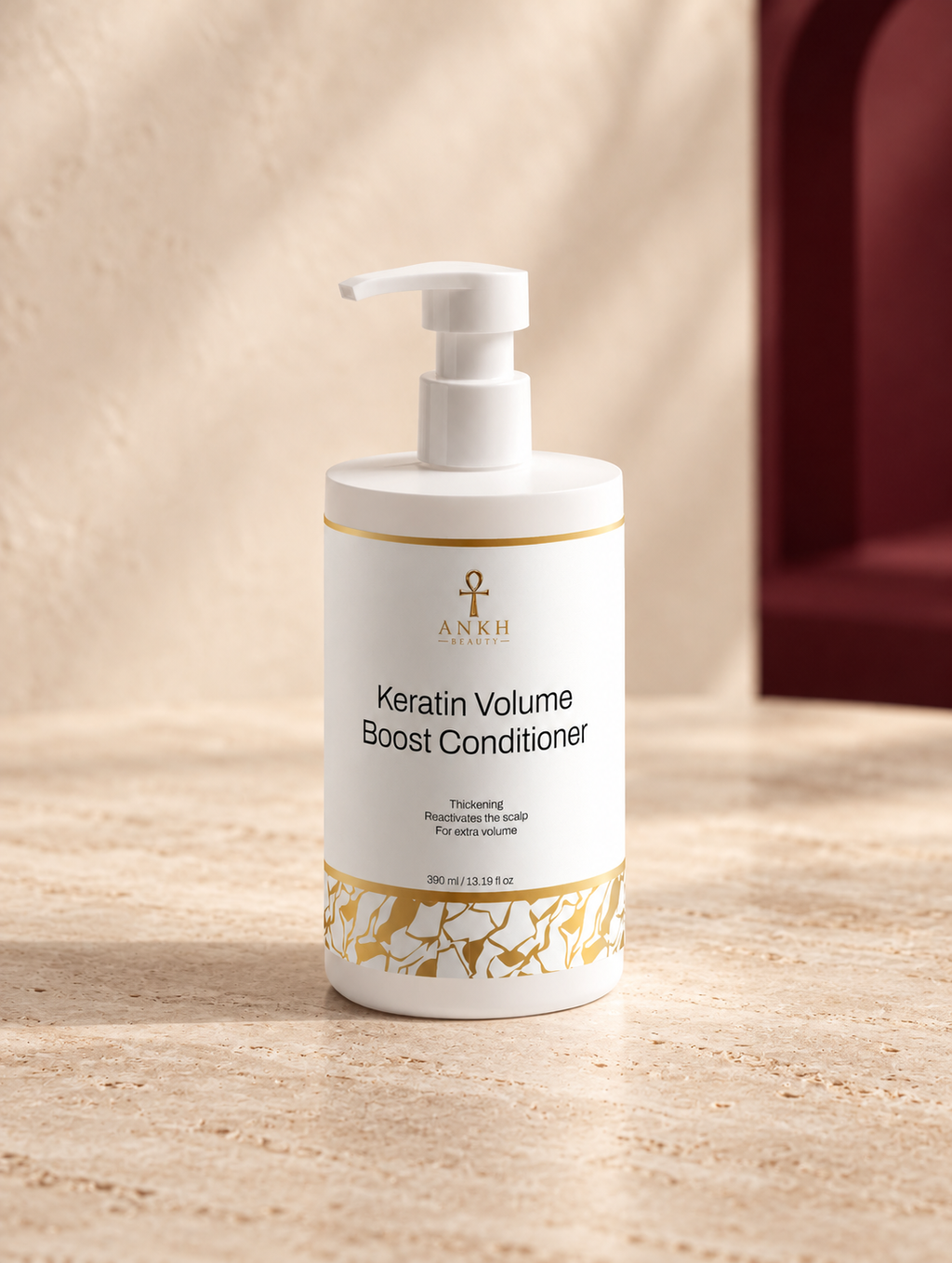 Keratin Volume Boost Conditioner, original Ankh Beauty packaging on warm ivory stone