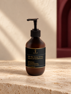 Silk Skin Body Serum, Spices & Sandalwood, original Ankh Beauty packaging on warm ivory stone