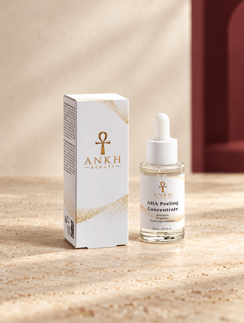 AHA Peeling Concentrate, original Ankh Beauty packaging on warm ivory stone