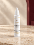 Microbiome Prebiotics Face Mist, original Ankh Beauty packaging on warm ivory stone